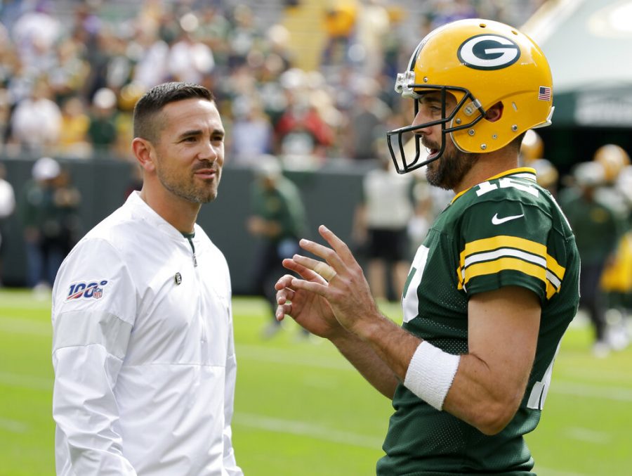 In this Sept. 15, 2019, file photo, Green Bay Packers quarterback Aaron Rodgers talks to coach Matt LaFleur before the team's NFL football game against the Minnesota Vikings in Green Bay, Wis. Rodgers says all those Zoom sessions during this unusual offseason improved his comfort level with the offense and his working relationship with second-year coach LaFleur. 