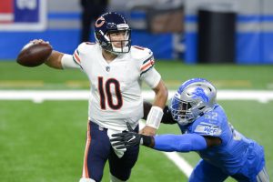 Chicago Bears quarterback Mitchell Trubisky (10) throws under pressure from Detroit Lions outside linebacker Christian Jones (52) in the first half of an NFL football game against the in Detroit, Sunday, Sept. 13, 2020. 