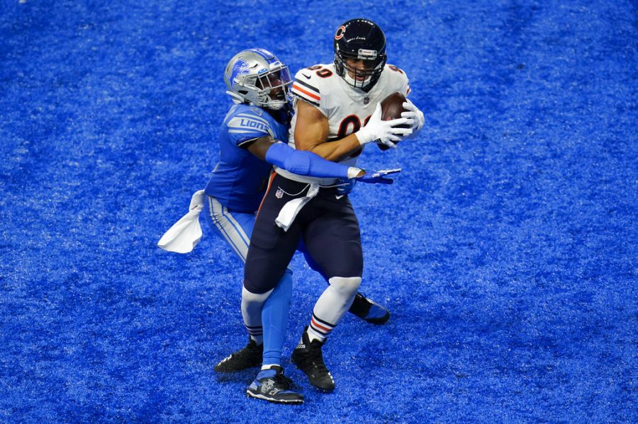 Chicago Bears tight end Jimmy Graham (80) catches a two-yard touchdown pass as Detroit Lions defensive back Tracy Walker (21) defends in the second half of an NFL football game in Detroit, Sunday, Sept. 13, 2020. 