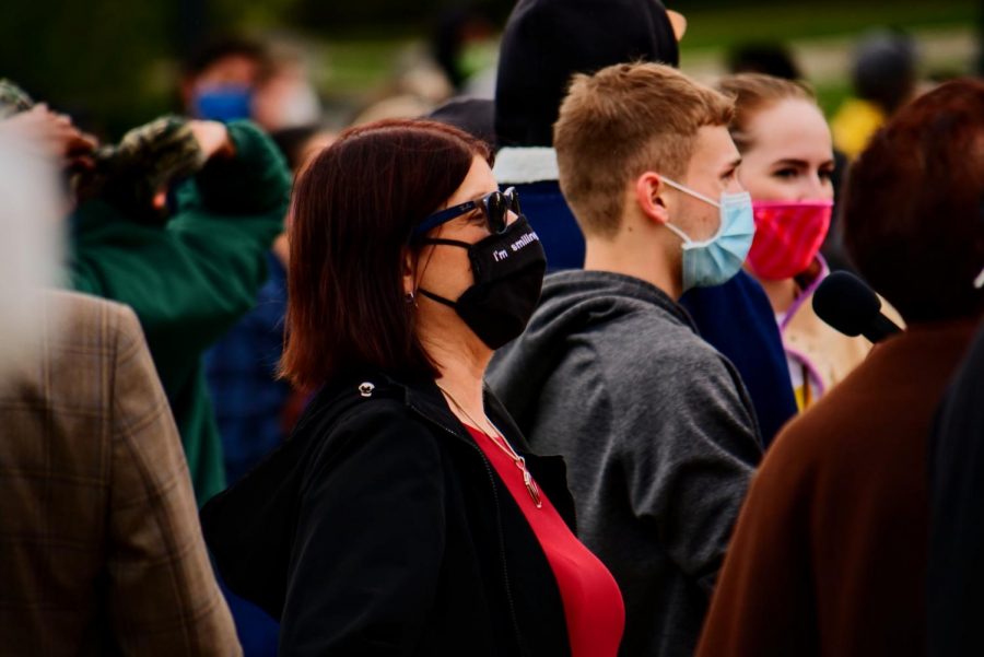 NIU President Lisa Freeman attends the Art and Soul Black Lives Matter street painting event Oct. 1. Smith said that Freeman and other professors have reached out to learn how they can make NIU better for black students.