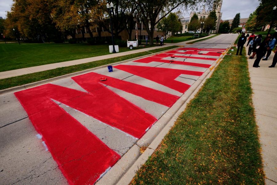 The word "Matter" from the phrase "Black Lives Matter" is painted in red letters along Castle Drive.