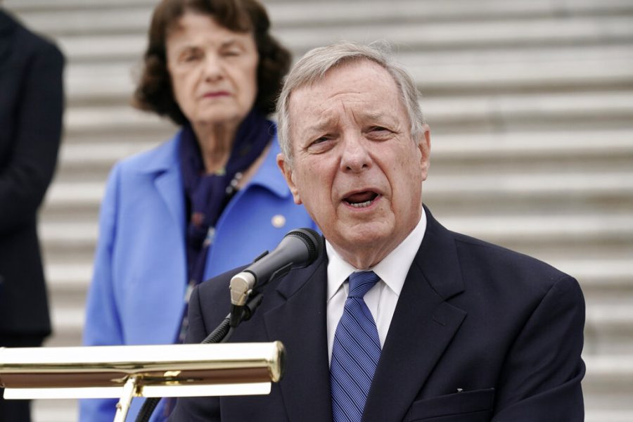 FILE - In this Oct. 22, 2020 file photo, Sen. Dick Durbin, D-Ill., speaks during a news conference at the Capitol in Washington. Durbin is running for re_election against Republican Tom Cotton in the Nov. 3, 2020, general election. (AP Photo/J. Scott Applewhite File)