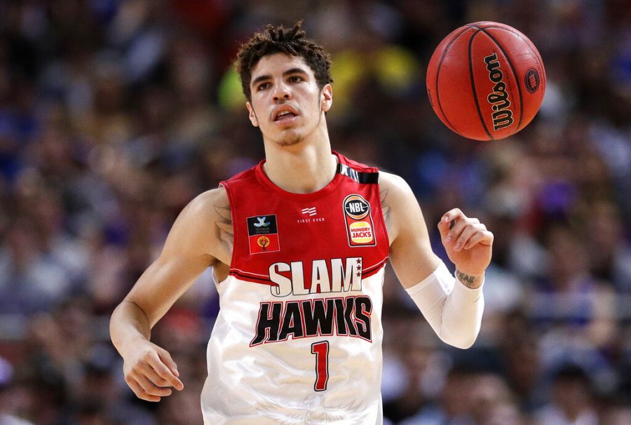 FILE - In this Nov. 17, 2019, file photo, LaMelo Ball of the Illawarra Hawks brings the ball up during a game against the Sydney Kings in the Australian Basketball League in Sydney. LaMelo Ball is expected to be one of the top picks in the NBA Draft, Wednesday, Nov. 18, 2020.