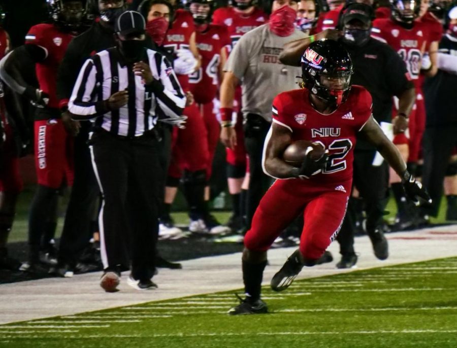 Redshirt first-year tailback Rondarius Gregory escapes defenders Nov. 11, as he runs down the sideline during NIU's 49-30 loss to the University at Buffalo Bulls at Huskie Stadium.