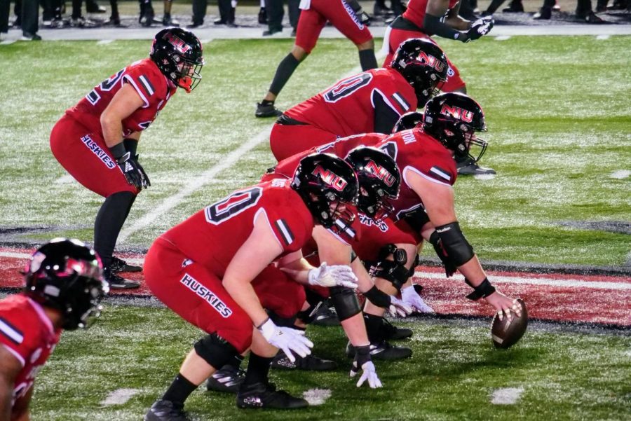 NIUs offense waits at the line of scrimmage for action to resume Nov. 4 during NIUs 49-30 loss to the University at Buffalo Bulls at Huskie Stadium in DeKalb.