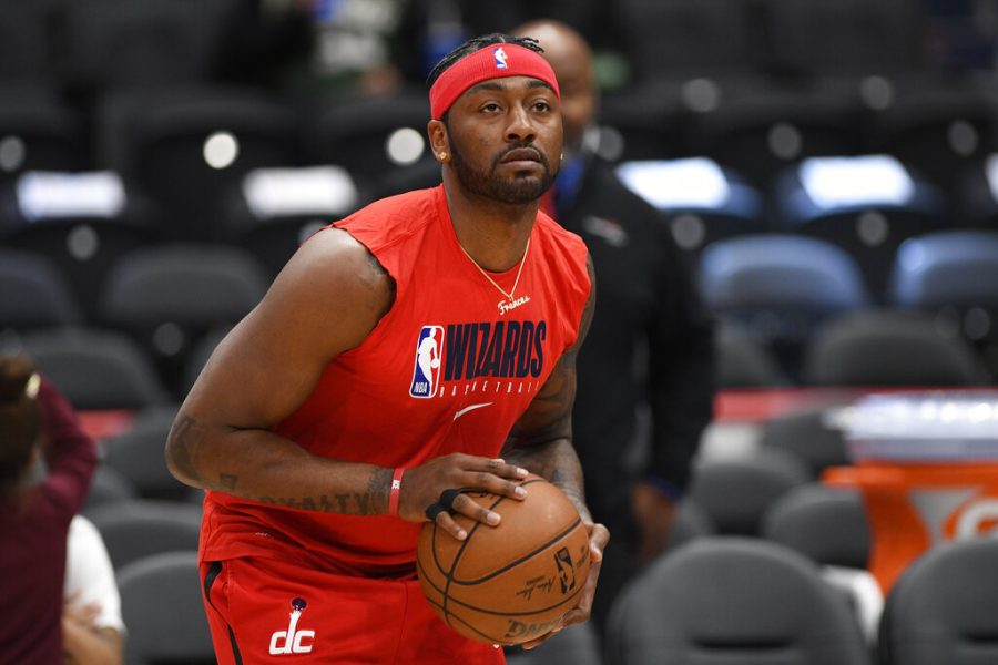 FILE - In this Monday, Feb. 24, 2020 file photo, Washington Wizards guard John Wall works out prior to an NBA basketball game against the Milwaukee Bucks in Washington. The Houston Rockets have traded Russell Westbrook to the Washington Wizards for John Wall and a future lottery-protected. first-round pick. Both teams announced the trade Wednesday night, Dec. 2., 2020.