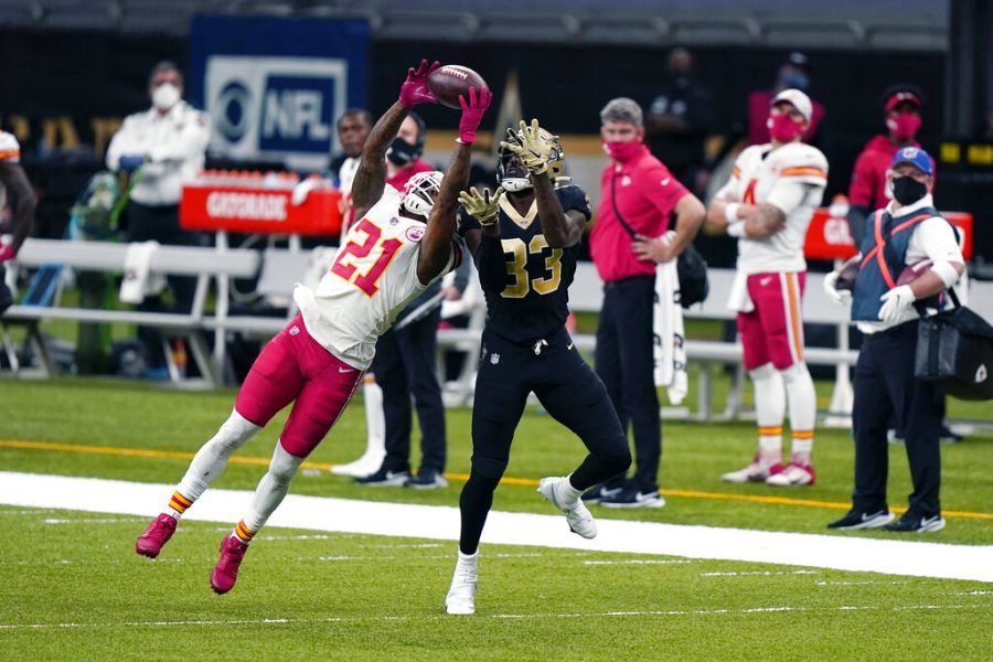 Kansas City Chiefs cornerback Bashaud Breeland (21) breaks up a pass intended for New Orleans Saints wide receiver Juwan Johnson (83) in the second half of an NFL football game in New Orleans, Sunday, Dec. 20, 2020.