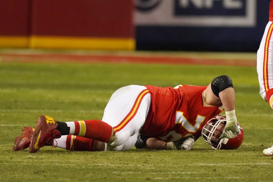 Kansas City Chiefs offensive tackle Eric Fisher reacts after getting injured during the second half of the AFC championship NFL football game against the Buffalo Bills, Jan. 24, 2021, in Kansas City, Missouri.