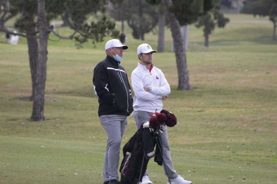 NIU Mens Head Coach John Carlson (left) seen here talking to junior Tommy Dunsire (right) discuss an approach shot during the first round of the 2021 Lamkin Grip San Diego Classic at San Diego Country Club.