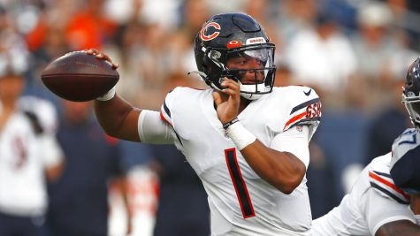 Chicago Bears quarterback Justin Fields plays against the Tennessee Titans in the first half of a preseason NFL football game Saturday, Aug. 28, 2021, in Nashville, Tenn. (AP Photo/Wade Payne)