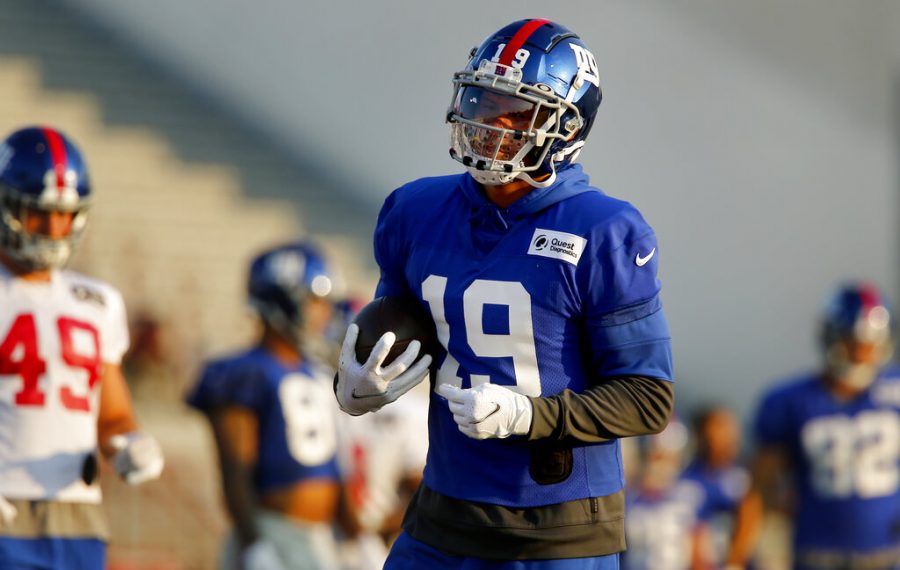 Wide receiver Kenny Golladay runs with the ball during New York Giants NFL training camp held at Eddie Moraes Stadium, Saturday, July 31, 2021, in Newark, N.J. 