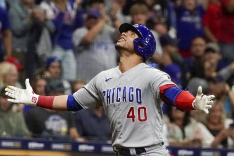 Chicago Cubs Willson Contreras reacts after hitting a home run during the seventh inning of a baseball game against the Milwaukee Brewers Saturday, Sept. 18, 2021, in Milwaukee.