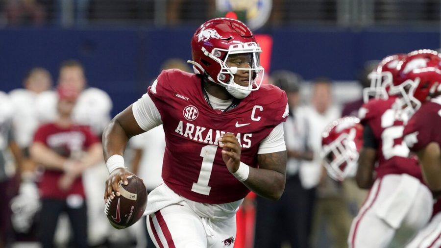 Arkansas quarterback KJ Jefferson (1) rolls out of the pocket before throwing a pass during an NCAA college football game against Texas A&M in Arlington, Texas, Saturday, Sept. 25.