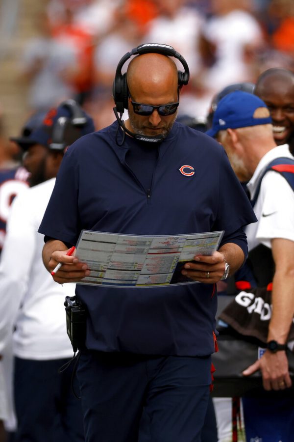 Chicago Bears head coach Matt Nagy looks for a play during an NFL football game against the Cleveland Browns, Sunday, Sept. 26, 2021, in Cleveland. (AP Photo/Kirk Irwin)