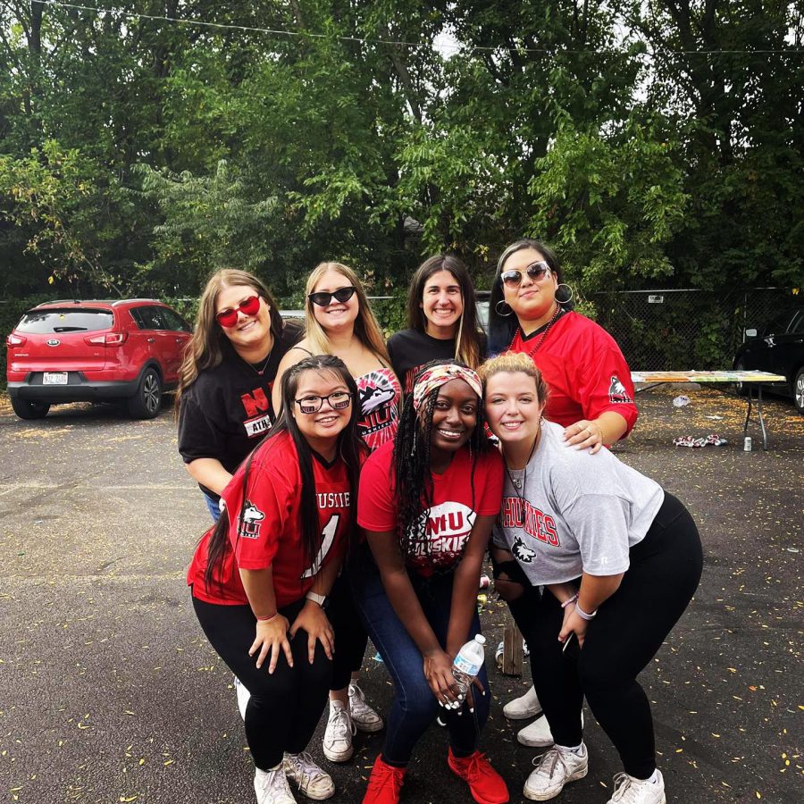 Janyce-Monique Johnson (bottom center) showing Huskie pride before a sporting event. 