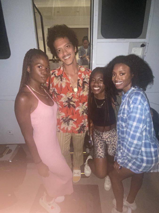 Former NIU student and Northern Star editor Cierra Chérie (located far right) with American singer-songwriter Bruno Mars.