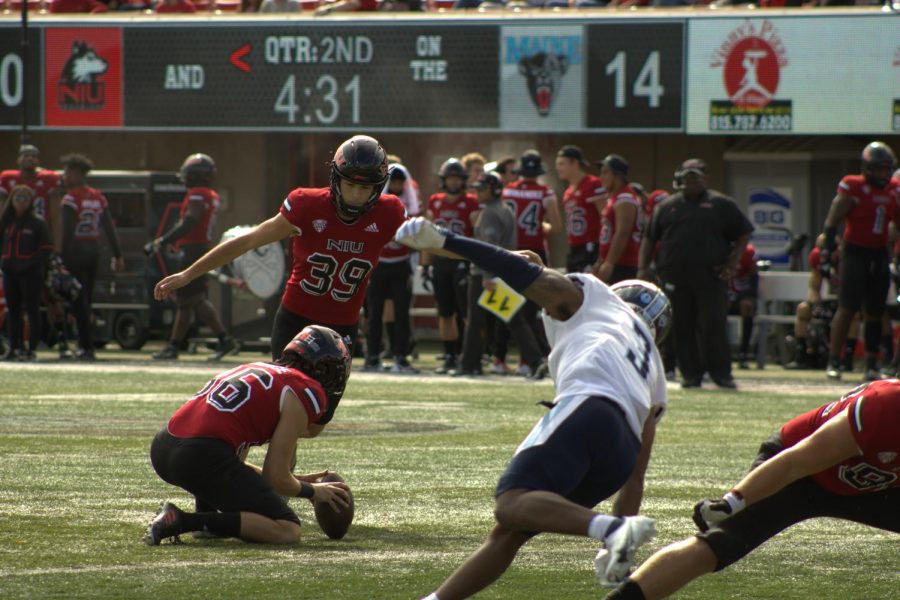 Redshirt sophomore John Richardson kicks a field goal in the second quarter against the University of Maine on Sept. 25. Richardson tied the school record of five made field goals in a game with his game-winning kick against Toledo on Oct. 9. 