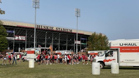 Fans tailgate before the NIU-Wyoming football game at Huskie Stadium on Sept. 11.