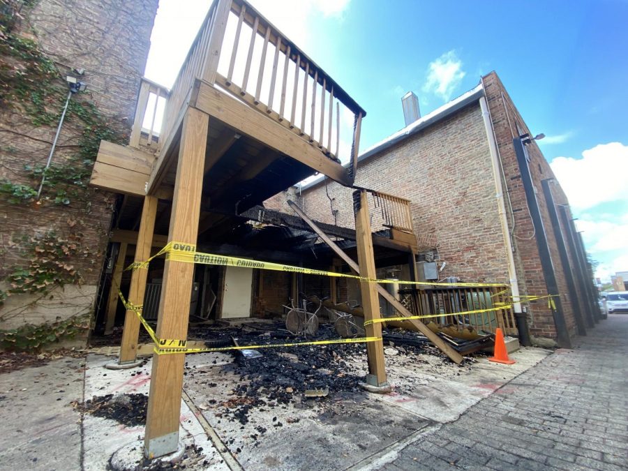 The+damage+from+the+back+porch+of+Hometown+Sports+Bar+and+Grill+is+blocked+by+yellow+tape.