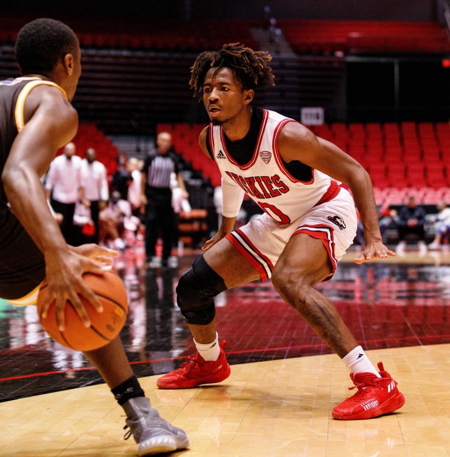 Sophomore guard Keshawn Williams guards a St. Francis player in NIUs pre-season exhibition on Oct. 30 at the Convocation Center. Williams, a transfer from Tulsa, had 14 points. (Khavon Thomas | Northern Star)