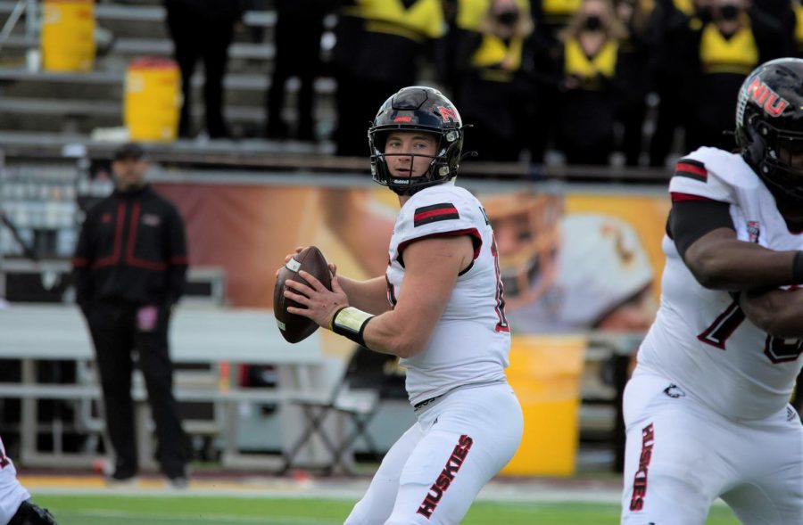 Junior quarterback Rocky Lombardi looks for an open man during NIU's game on Oct. 23 against Central Michigan. Lombardi threw for 320 yards and three touchdowns.