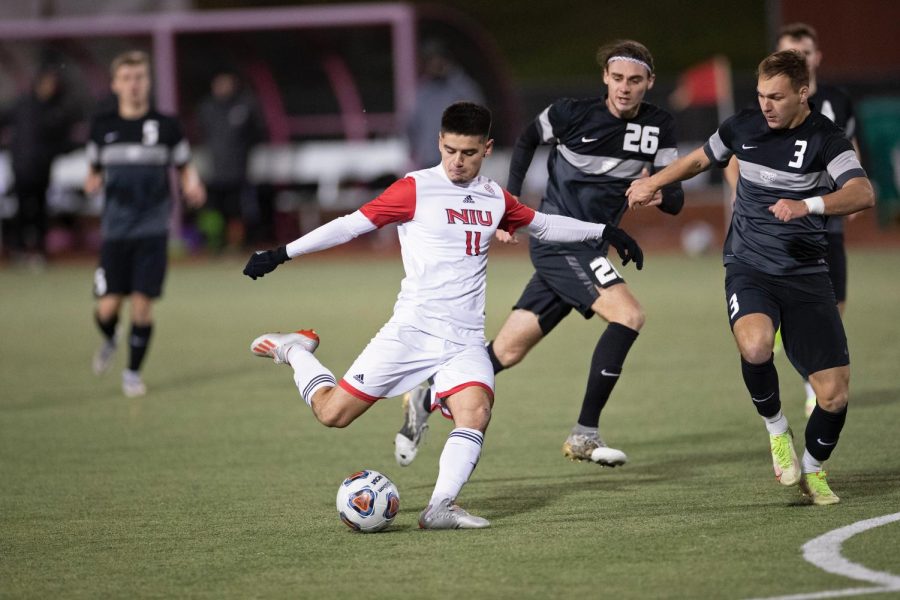 Sophomore midfielder Diego Maynez loads up for a shot on goal during Thursdays 2-1 victory over Oakland in the first-round of the NCAA College Cup. Maynez scored both of the Huskies goals in the contest.