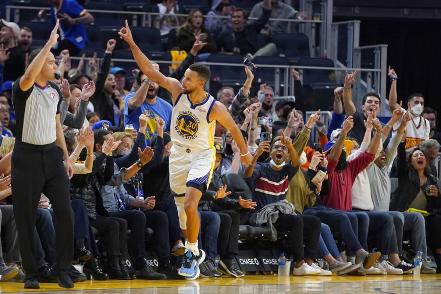 Golden State Warriors guard Stephen Curry (30) celebrates with after scoring against the Memphis Grizzlies during an NBA basketball game in San Francisco, Thursday, Oct. 28, 2021.