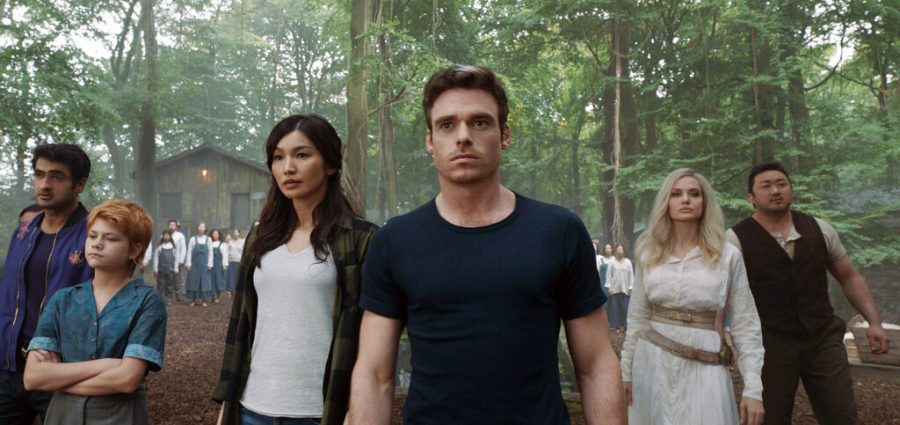 This image released by Marvel Studios shows, from left, Kumail Nanjiani, Lia McHugh, Gemma Chan, Richard Madden, Angelina Jolie and Don Lee in a scene from Eternals. 