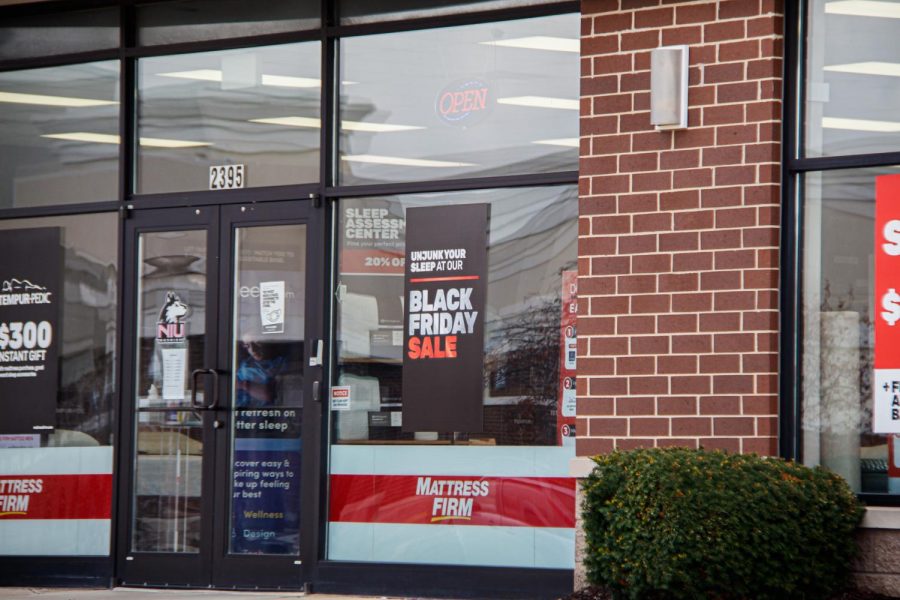 A Black Friday sign in the window of a store. 