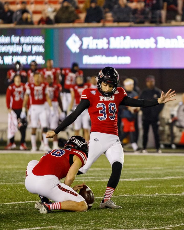 Redshirt sophomore kicker John Richardson sets to launch the game-winning field goal in NIUs 30-29 victory over the Ball State Cardinals on Nov. 10 at Huskie Stadium. The win is now NIUs third this season by a single point.