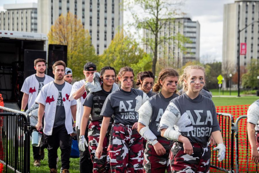The women of Alpha Sigma Alpha walk out into the trenches on Oct. 22 on the field outside the Rec Center for the first round of Womens Tugs. They were coached by fraternity Phi Kappa Psi. 