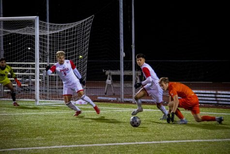Defensemen Adrian Lara (no. 5) tracks down the ball during a defensive stand during NIUs 5-2 victory over Bowling Green in the Mid-American Conference semi-final in Nov. 2021.