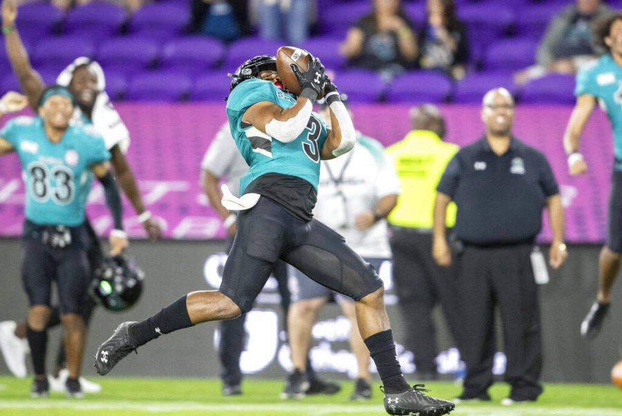Coastal Carolina wide receiver Aaron Bedgood (3) catches a touchdown pass  against Northern Illinois during the Cure Bowl NCAA college football game in Orlando, Fla., Friday, Dec. 17, 2021. 
