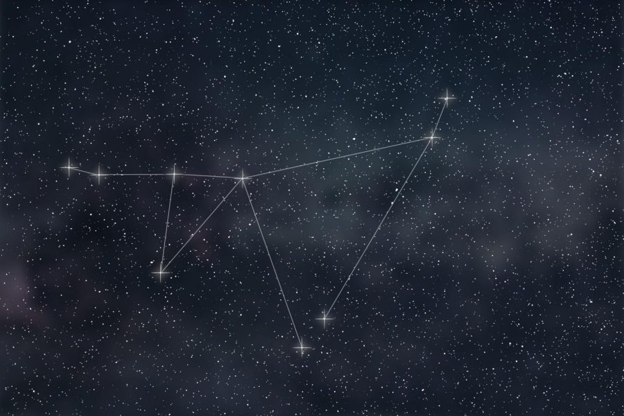 The constellation of Capricorn on a dark galaxy background.