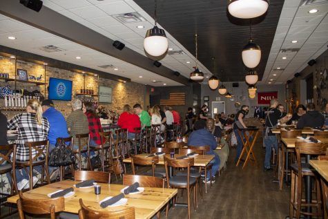A photograph of the inside of Keg & Kernel during the restaurants grand opening. 