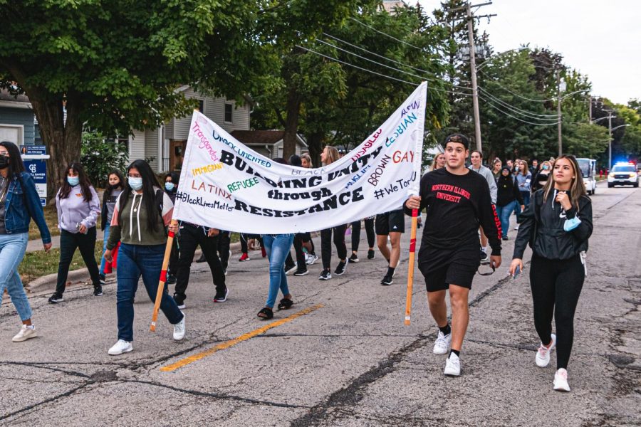 Students actively participated in the Unity Walk in 2021 and held up banner and signs about their expectations from the community.