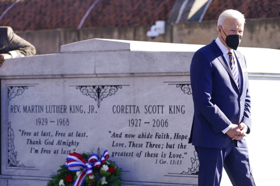 President Joe Biden walks away after a wreath laying at the tomb of the Rev. Martin Luther King Jr., and his wife Coretta Scott King, Tuesday, Jan. 11, 2022, in Atlanta. (AP Photo/Patrick Semansky)