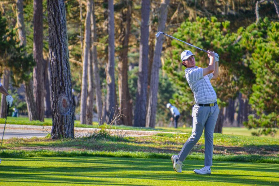 Freshman Ben Sluzas hits off on Poppy Hills Golf Course in Pebble Beach, California. NIU competed in the Saint Marys Invitational from Nov. 8 to Nov. 10, finishing in 17th place. (Wes Sanderson | Northern Star)