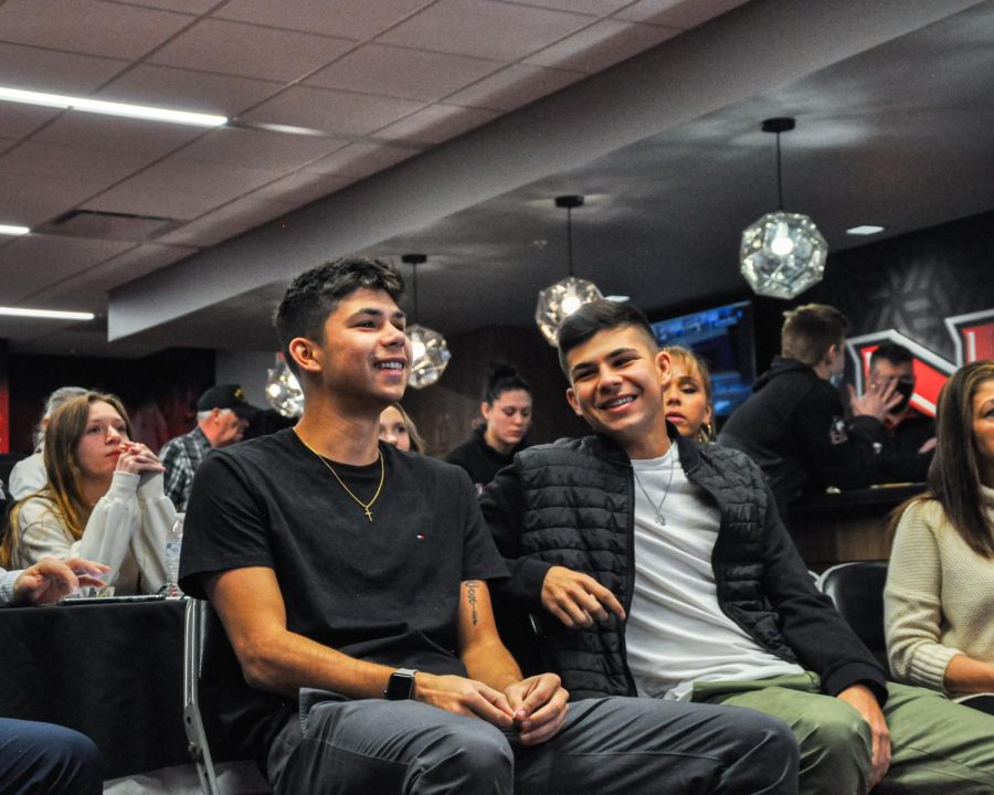 Nick Markanich (left) and brother Anthony laugh during Tuesdays 2022 MLS Super-draft coverage at the NIU Convocation center. Anthony was selected 26th overall by the Colorado Rapids and Nick 30th overall by FC Cincinnati. (Wes Sanderson | Northern Star)