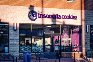 A photograph of the new DeKalb location of late-night dessert shop Insomnia Cookies.