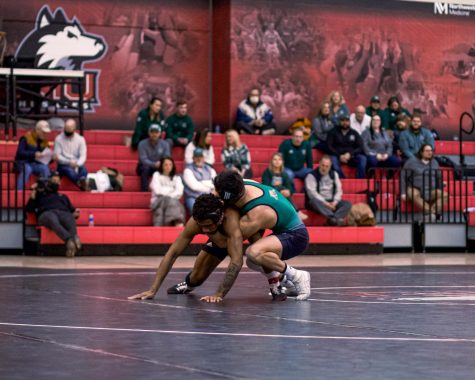 First day of MAC Wrestling Championships see two Huskies move on to the finals