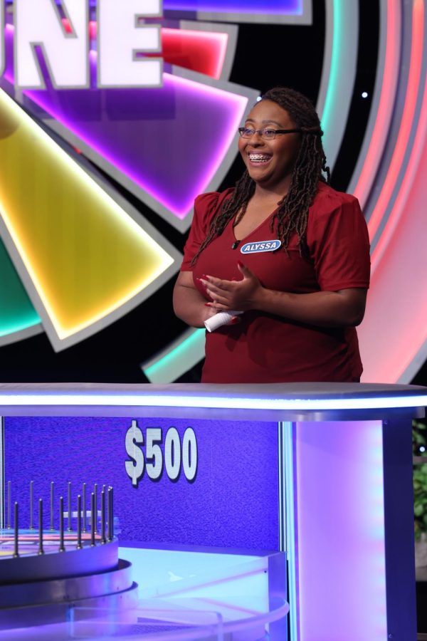 A photograph of Alyssa Tillmon, Wheel of Fortune®:  © 2021 Califon Productions, Inc. All Rights Reserved.