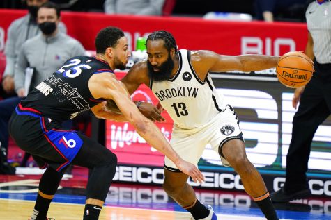 Brooklyn Nets James Harden (13) tries to drive past Philadelphia 76ers Ben Simmons (25) during the second half of an NBA basketball game, Saturday, Feb. 6, 2021, in Philadelphia.
Harden was traded Thursday to the 76ers as part of a blockbuster trade sending the former league MVP to Philadelphia. 
 (AP Photo/Matt Slocum, File)
