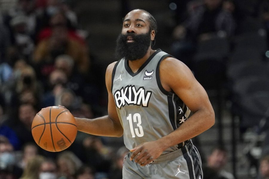 FILE - Brooklyn Nets guard James Harden (13) is shown during the first half of an NBA basketball game against the San Antonio Spurs, Friday, Jan. 21, 2022, in San Antonio. The Philadelphia 76ers have traded Ben Simmons to the Brooklyn Nets for James Harden as part of a multiplayer deal. The trade was confirmed by multiple people who spoke to The Associated Press Thursday, Feb. 10, 2022, on condition of anonymity because the trade had not been announced.  (AP Photo/Eric Gay, File)