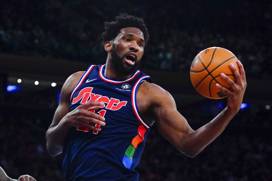 Philadelphia 76ers Joel Embiid grabs a rebound during the second half of an NBA basketball game against the New York Knicks Sunday, Feb. 27, 2022, in New York. The 76ers won 125-109. (AP Photo/Frank Franklin II)
