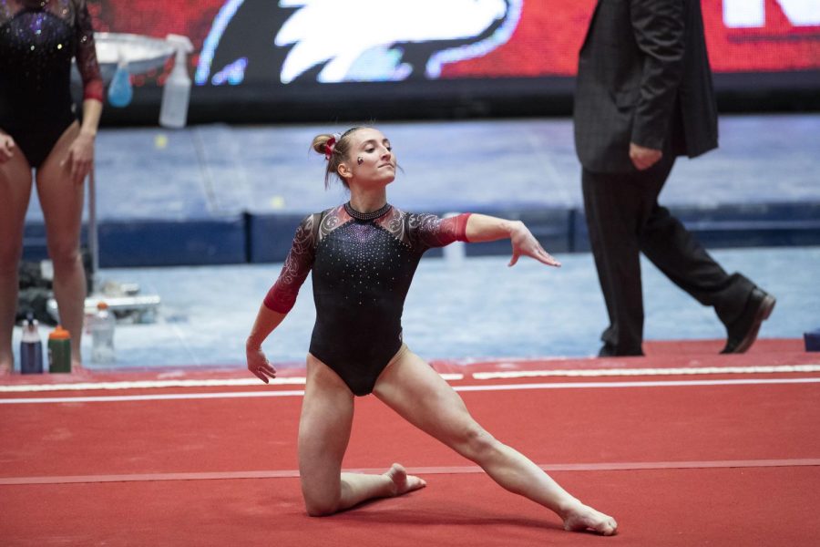 Then-junior Tara Kofmehl competes on the floor team in a meet against Kent State University on Feb. 27 during the 2021 season. NIU ended the event with a 194.825-194.775 victory.