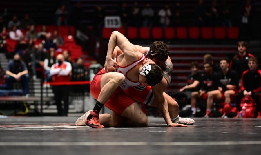 Senior wrestler Tristin Gauman competes in the NIU Convocation Center. 
Wrestling matchups took place simultaneously with gymnastics events.