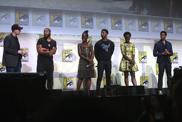 Kevin Feige, Ryan Coogler, Lupita Nyongo, Michael B. Jordan, Danai Gurira and Chadwick Boseman speaking at the 2016 San Diego Comic Con for Black Panther (Gage Skidmore | Wikimedia Commons)