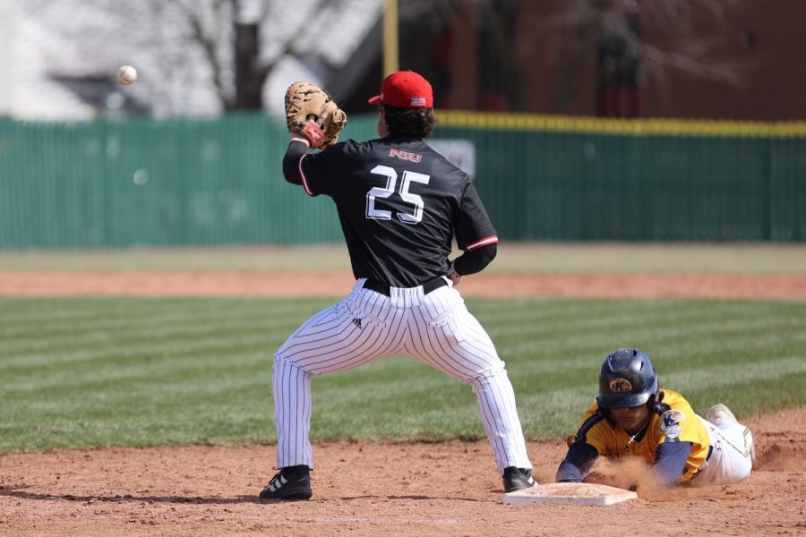 Sophomore infielder Mason Kelley (25) plays first base during a game against Kent State March 28 in DeKalb.