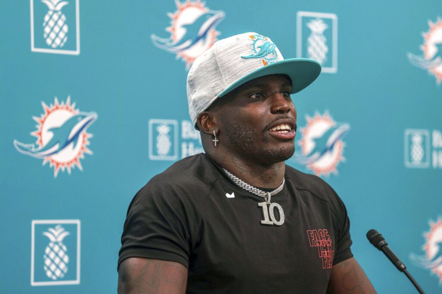 New Miami Dolphins wide receiver Tyreek Hill holds his first news conference among family members and the media in Miami Gardens, Florida, March 24. (Carl Juste/Miami Herald via AP)